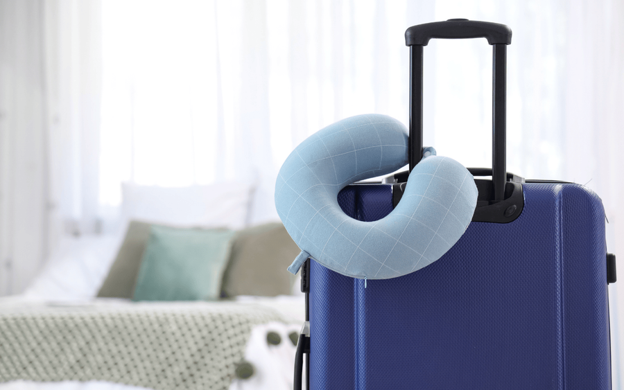 Neck pillow on a suitcase